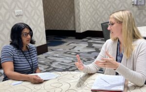 two members in conversation at the PRS annual meeting