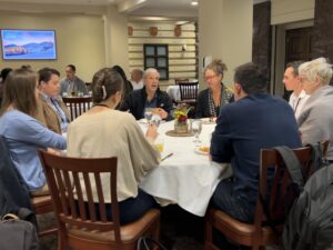 The PRS pre-meeting workshop includes eating meals with faculty members.