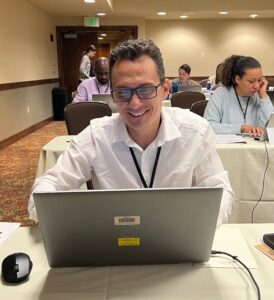 At PRS Young Investigator Grant Writing Workshop, Thiago Martins, PhD edits his grant proposal.