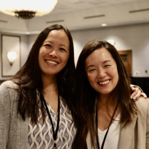 Two colleagues attend national scientific meeting.