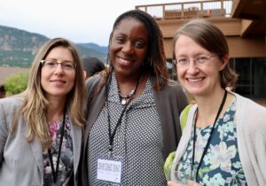 Three participants attend opening reception at an annual scientific meeting in Colorado Springs.
