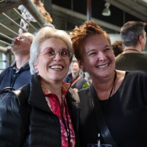 Two perinatal researchers attend special Giraffe Feeding event during an annual scientific meeting in Colorado Springs, CO.