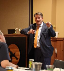 Speaker answers question from the audience.