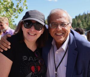 Two perinatal researchers pose at the 2025 annual meeting of a research society.